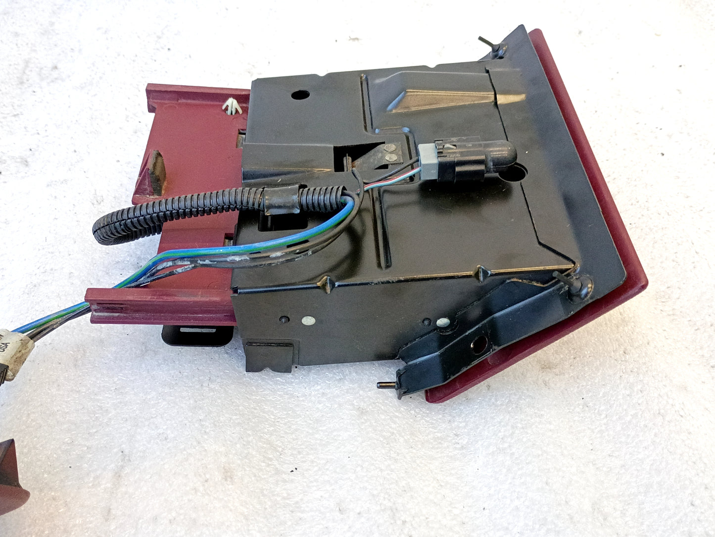 Refurbished dark ruby red ashtray assembly with mounting bracket and wire harness for 1992-1996 Ford F150, F250, F350, Bronco.