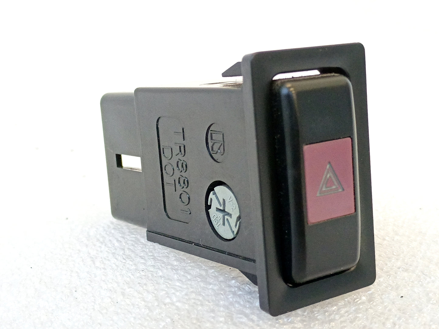 Toyota hazard flasher switch for 1989-1995 Truck/4Runner, OEM part number 84332-89110, mounts in cluster bezel.