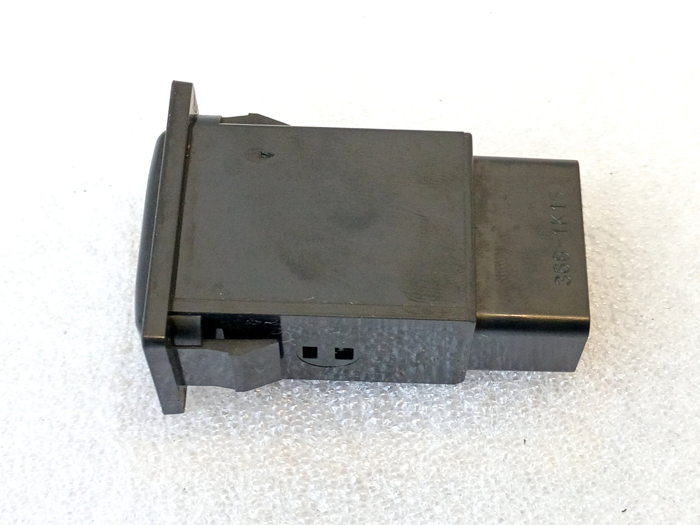 Toyota hazard flasher switch, compatible with 1989-1995 Truck/4Runner, part number 84332-89110, black rectangular design.