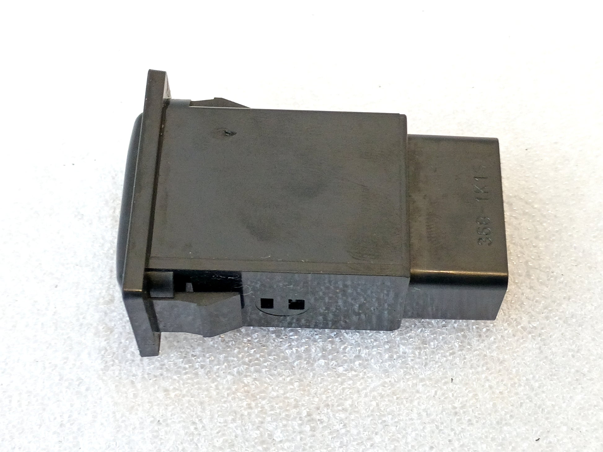 Toyota hazard flasher switch, compatible with 1989-1995 Truck/4Runner, part number 84332-89110, black rectangular design.
