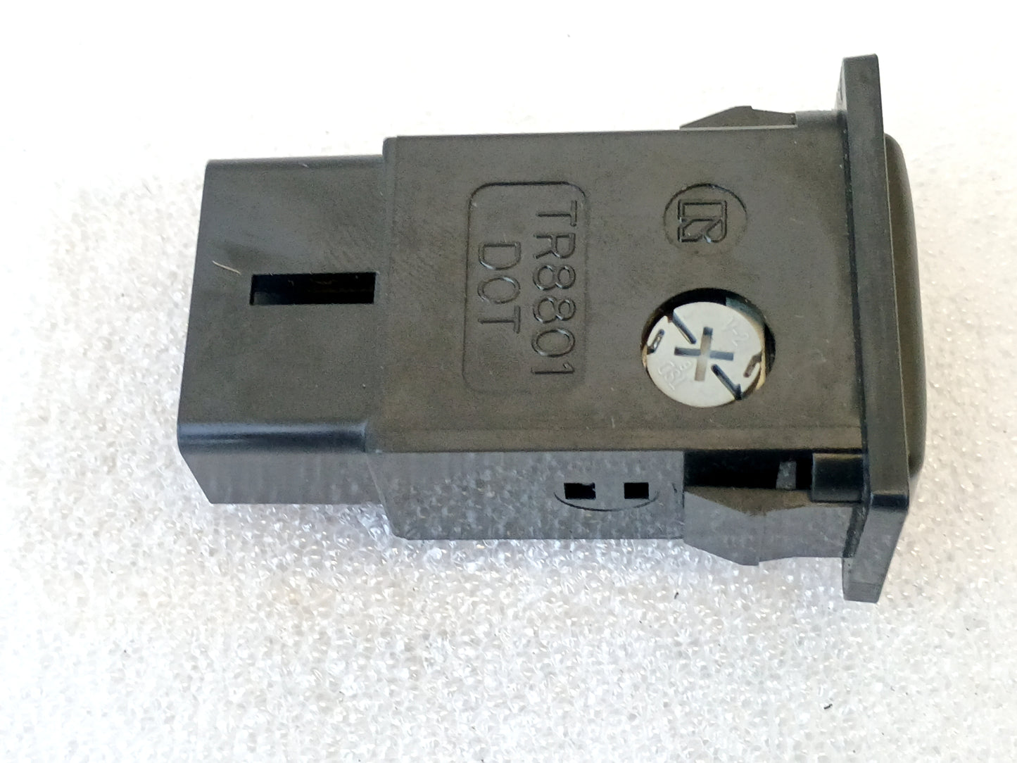 Toyota hazard flasher switch for 1989-1995 Truck and 4Runner, OEM part 84332-89110, black rectangular design.