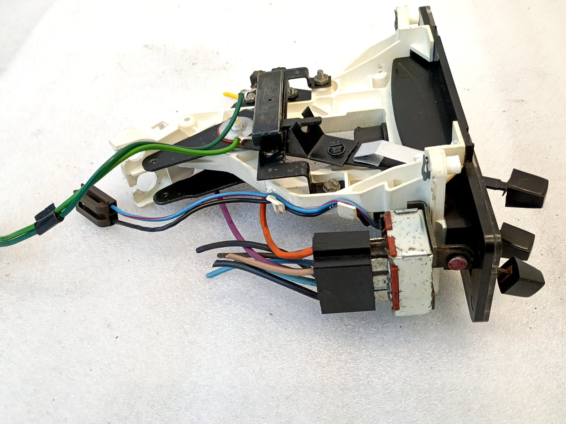 Ford OEM heater and AC control panel with colored wiring, suitable for 1980-1986 Bronco and F-Series models.