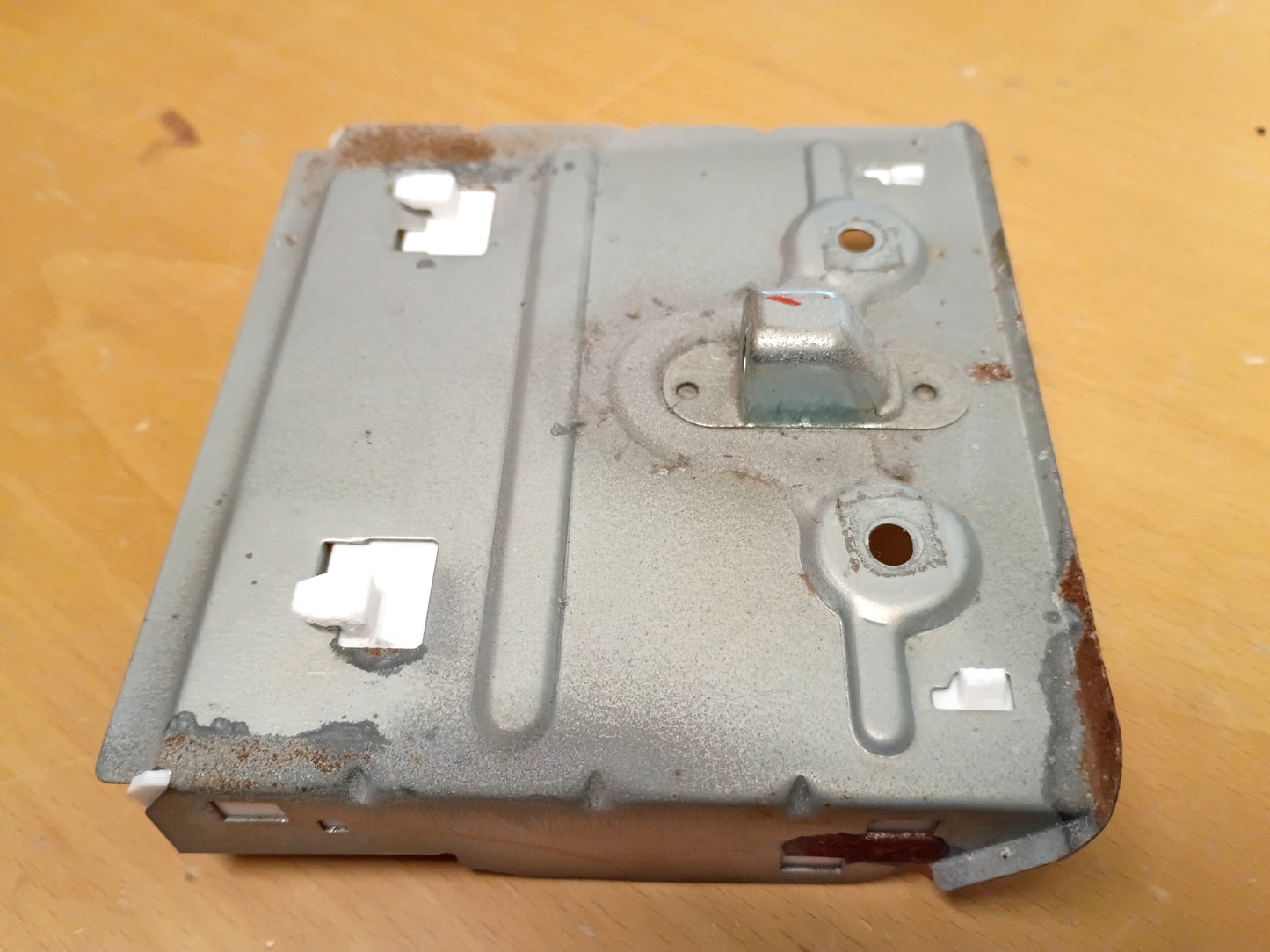Metal ashtray guide set for Toyota vehicles (1989-2004) with updated design; white plastic clips for secure installation.