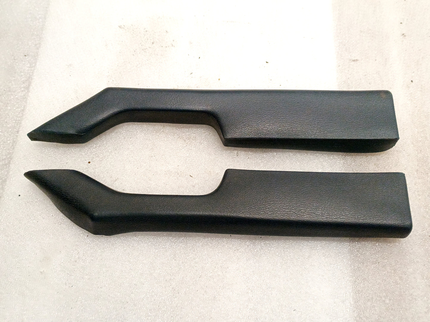 Dark Harbor Blue arm rest set for 1980-1986 Ford F150, F250, F350, Bronco. OEM parts. Left and right pieces shown.