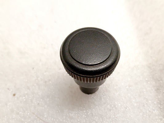Ford OEM headlight switch knob for 1992-1997 F150, F250, F350, Bronco. Round, textured black with mounting grooves.