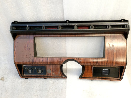Ford F250/F350 gauge cluster bezel, rose wood grain, diesel indicator lights, compatible with 1980-1986 models.