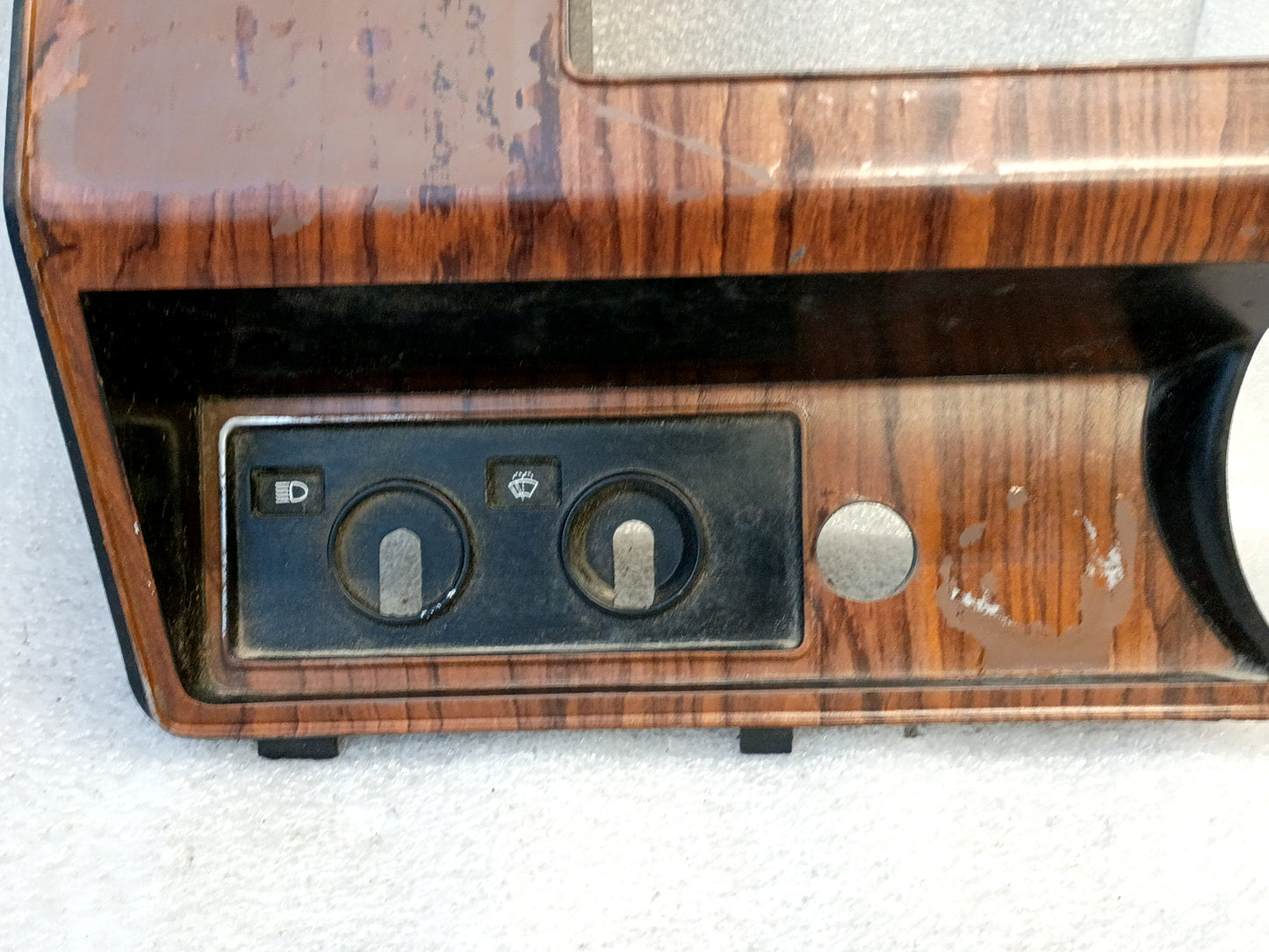 Rose Wood gauge cluster bezel with diesel indicator lights for Ford F250/F350, 80-86 model. Features wood grain pattern.