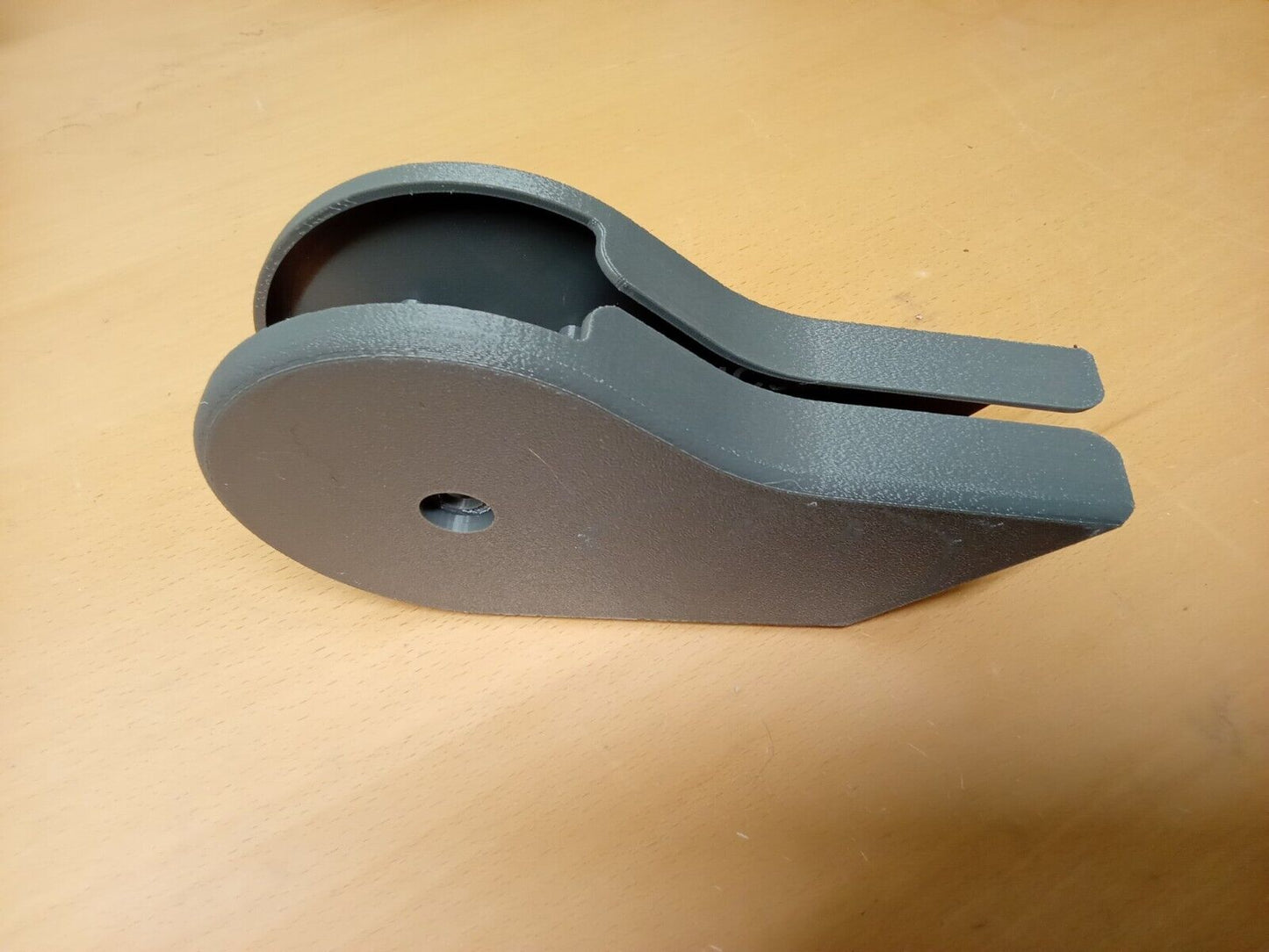 Opal gray split seat hinge cover for 1992-1997 Ford F150, F250, and F350 OBS trucks, featuring a durable, textured plastic finish with a central mounting hole.