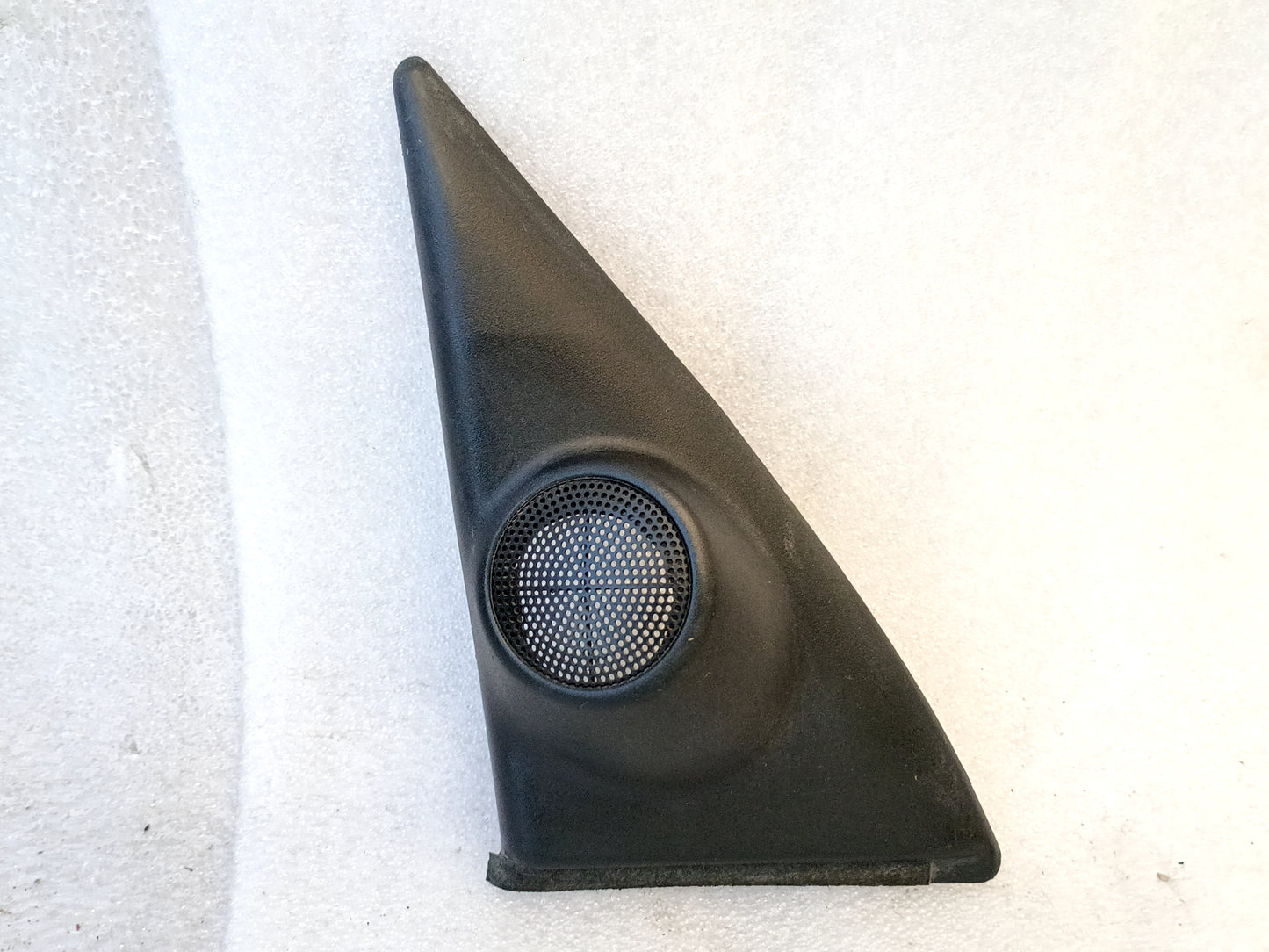Toyota Tacoma 1995-2004 left mirror bolt trim speaker cover, black, part 67492-35010, mounts inside front door.
