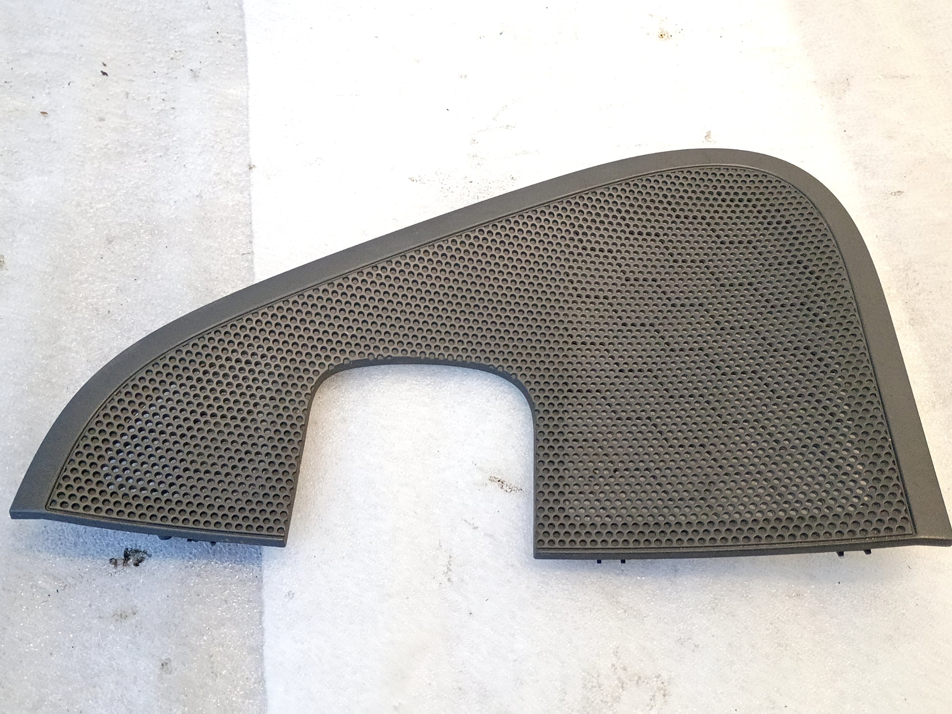 OEM Ford F150 speaker grill cover, dark gray, perforated design, fits 2004-2008 models, interior door panel mount.