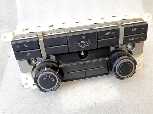 Ford F150 heater and A/C climate control unit with heated seat switches, part number 9L34-19980-GB, for 2009 model.