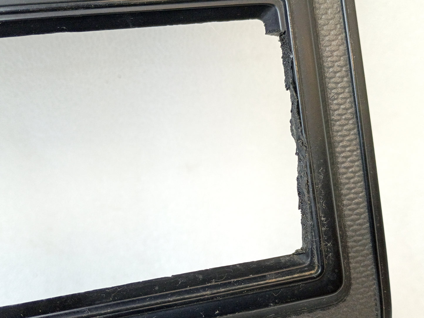 Silver radio and heater bezel for Ford trucks, with a single DIN radio hole, compatible with 1980-1986 models.