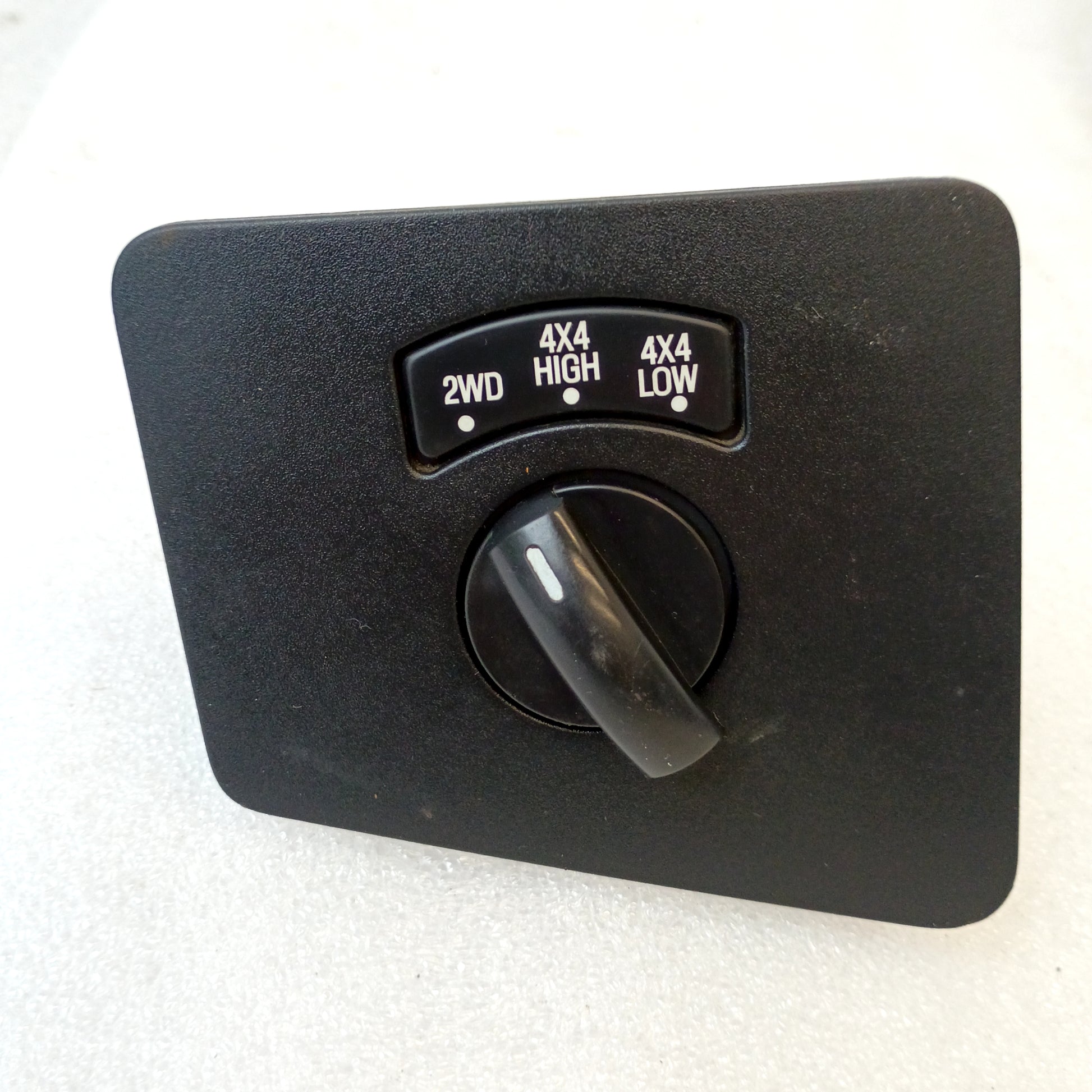 Electronic transfer case switch for 2008-2010 F-150 and Bronco, featuring 2WD, 4x4 High, and 4x4 Low options.