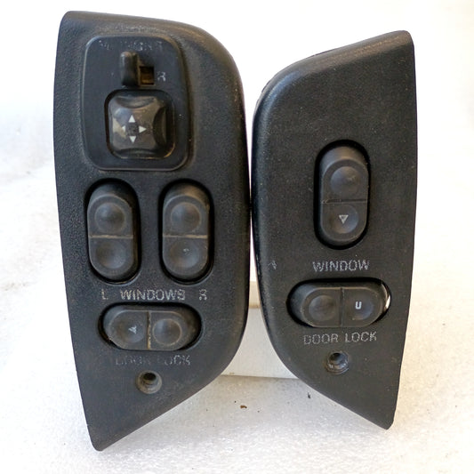 Black left and right door power window, lock, and mirror switch set with bezels for Ford F150-F350 and Bronco.