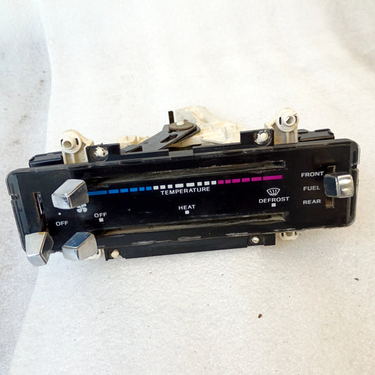 Ford F-series heater control panel with fuel switch, temperature slide, and color indicators, fits 1980-1986 models.