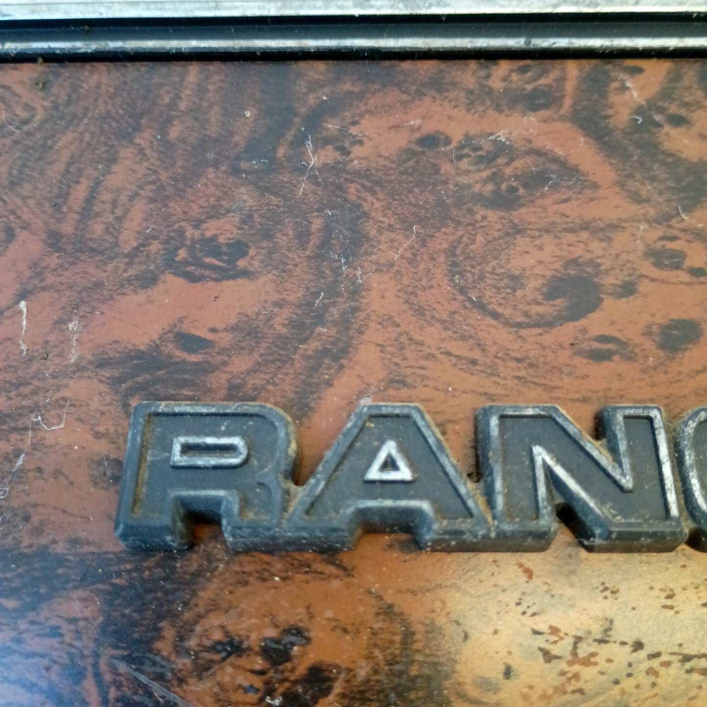 73-79 Wood Grain Glove Box Cover w/ Ranger XLT Emblem (Used) Ford F100 F250 F350 XLT