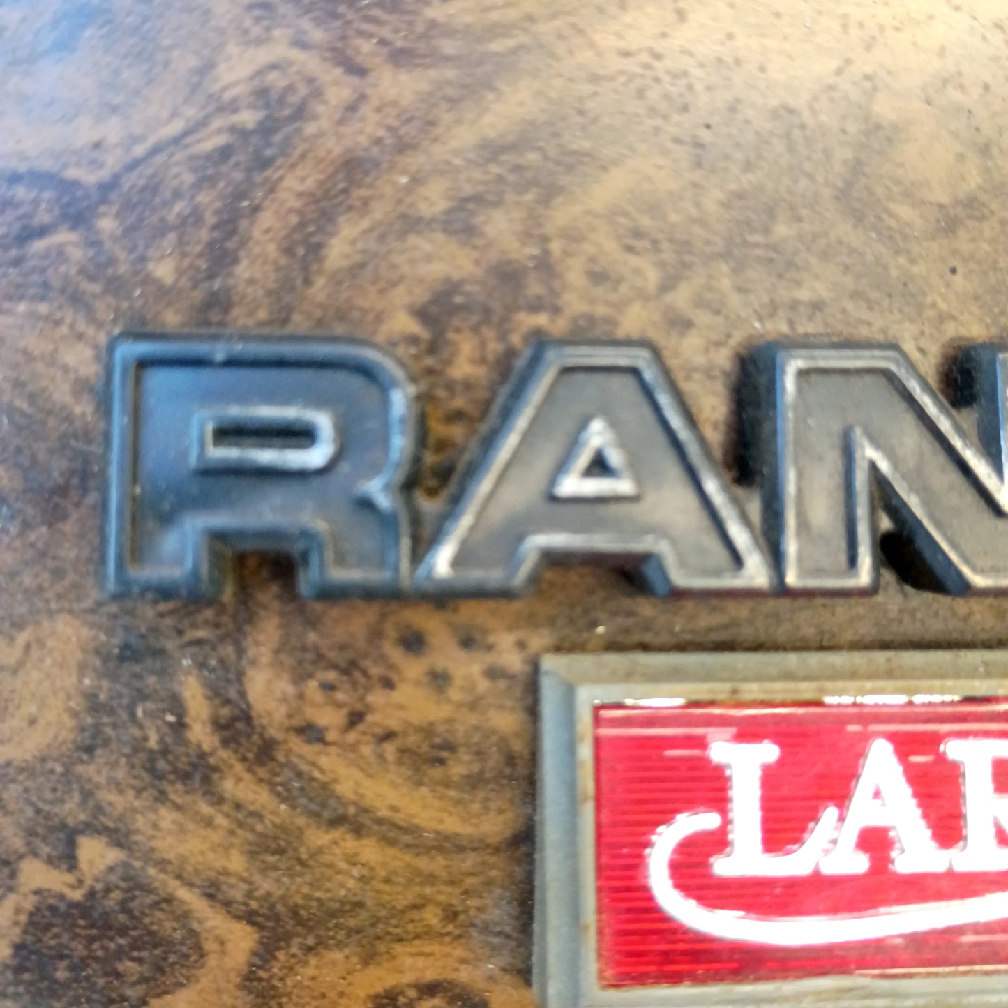 73-79 Green/Woodgrain Glove Box Door w/ Ranger Lariat Emblem (Used) Ford F100 F150 F250