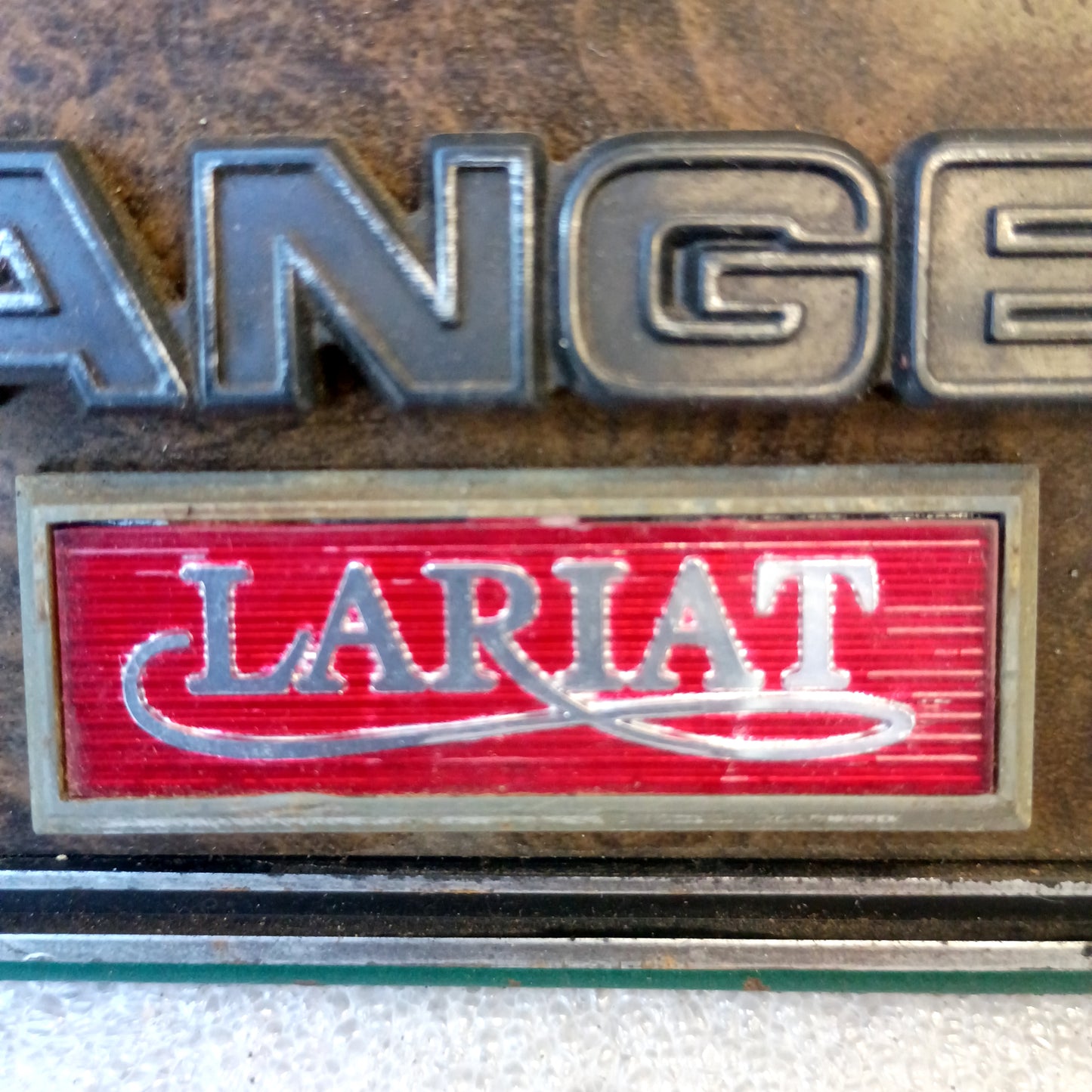 73-79 Green/Woodgrain Glove Box Door w/ Ranger Lariat Emblem (Used) Ford F100 F150 F250