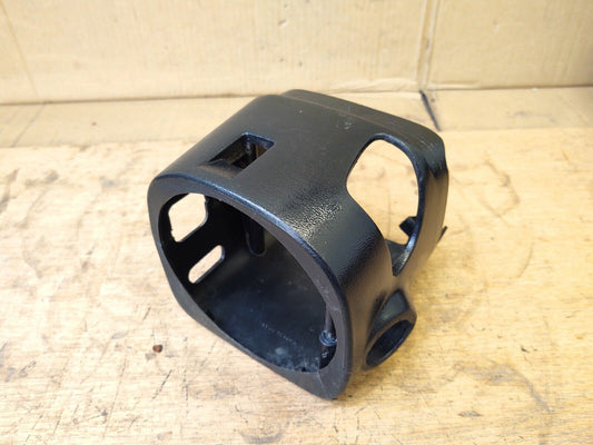 Black OEM Ford steering column trim shroud for 1992-1996 F150, F250, F350, and Bronco with automatic transmission and tilt steering, showing textured plastic construction and precise cutouts.