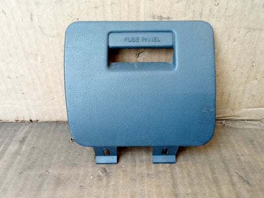 Dark blue fuse panel cover for 1992-1996 Ford F-Series and Bronco; mounts to lower right dash. Model F2TB-1504302-AAW.