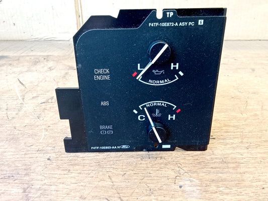 OEM Ford oil pressure and temperature gauge cluster for 1994-1997 F150, F250, F350, and Bronco. Features Check Engine, ABS, and Brake indicators. Part number F4TF-10E853-AA.