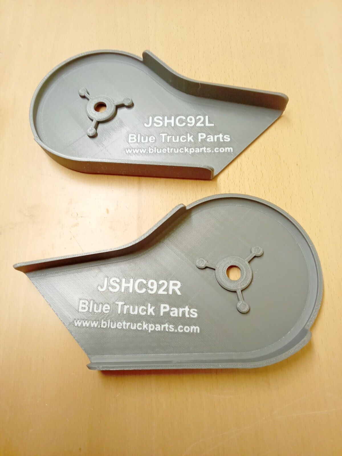 Pair of light opal gray seat hinge covers, left and right, for 1992-1997 Ford F150, F250, and F350 OBS trucks, featuring reinforced mounting holes by Blue Truck Parts.