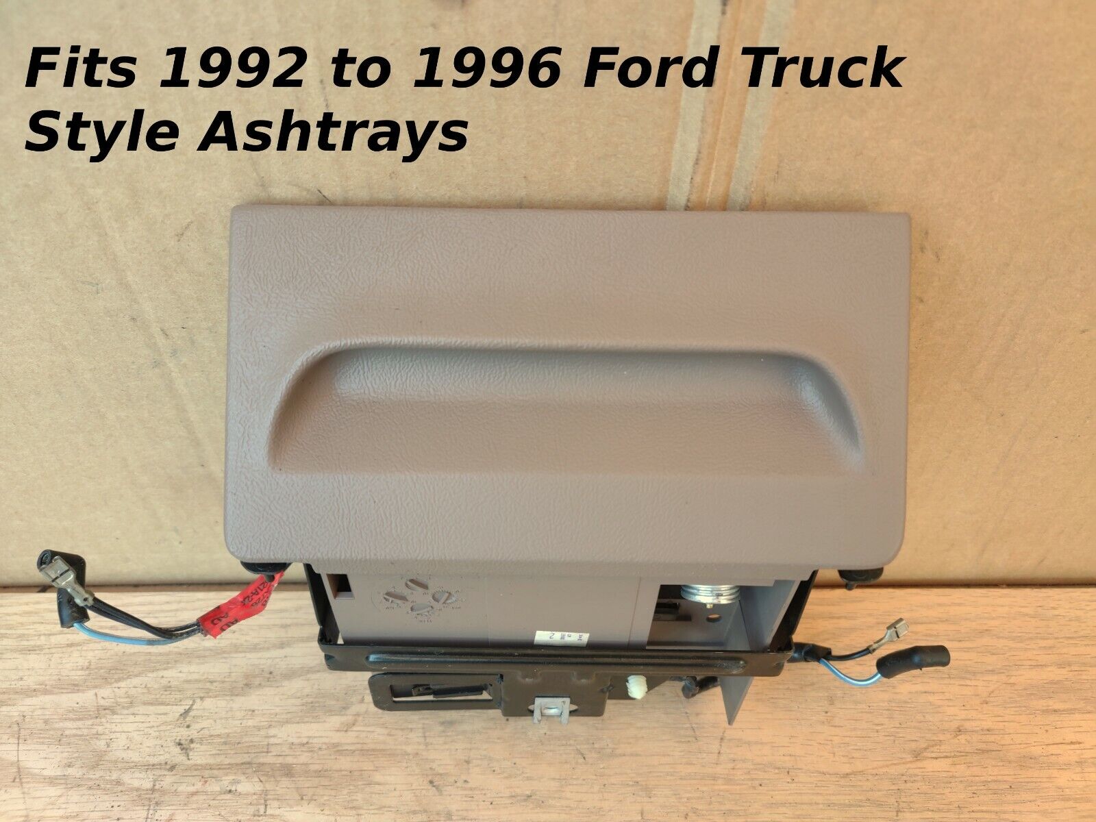 Tan dashboard ashtray assembly for 1992-1996 Ford trucks, shown with bracket and wiring. Overlaid text: Fits 1992 to 1996 Ford Truck Style Ashtrays.