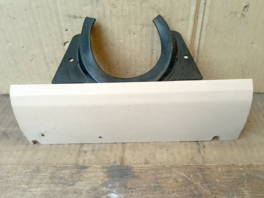 Fawn/light beige lower dash trim cover for Ford vehicles, intact mounting tabs, compatible with 1980-1986 F100-F350 and Bronco.