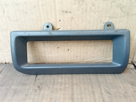 Dark gray heater bezel for 1992-1996 Ford Bronco, F-150, F-250, F-350; mounts to dash around heater controls.