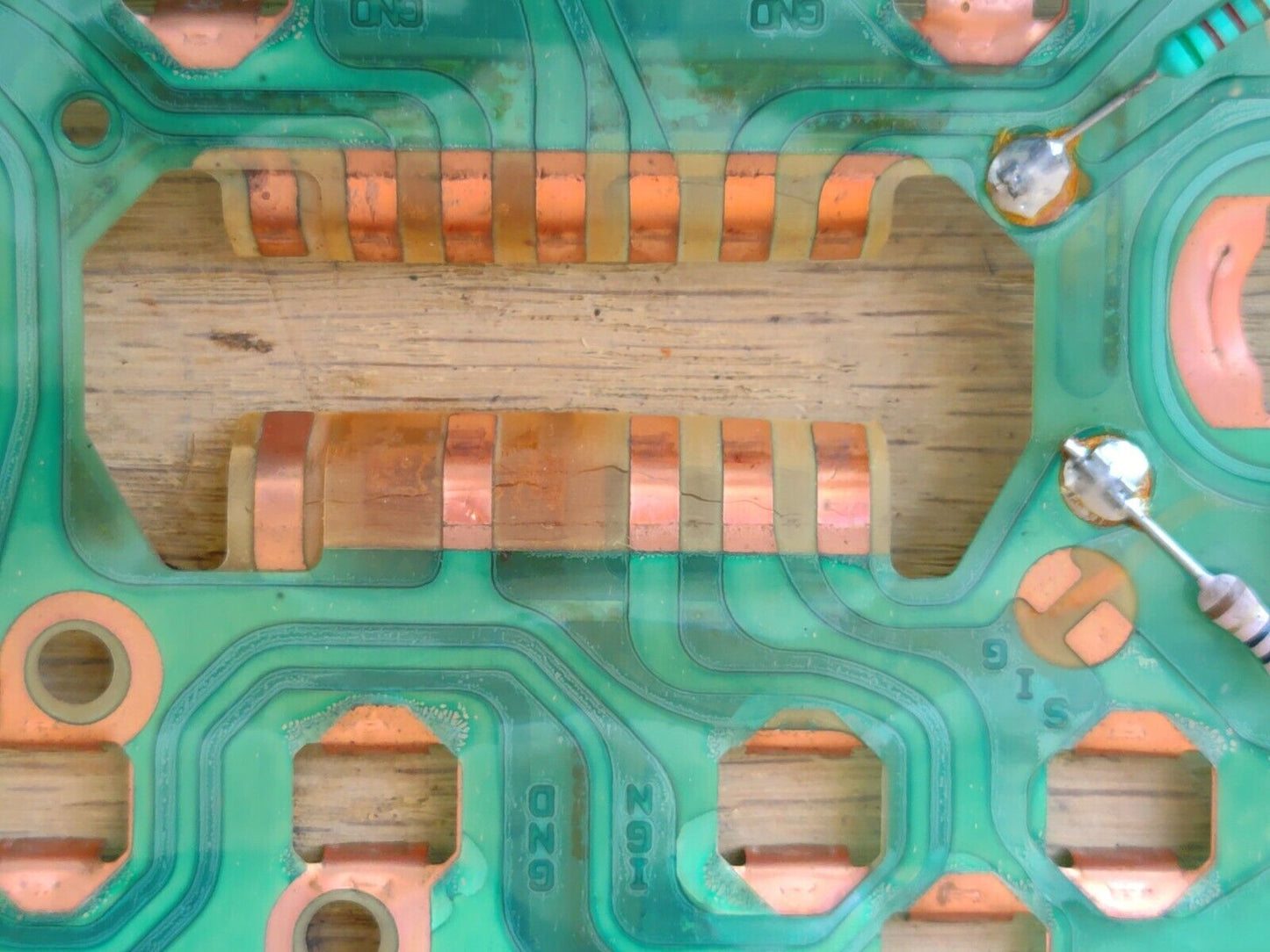 Ford 87-91 gauge cluster circuit board for F150-F350, Bronco; copper wires in good condition on green plastic backing.