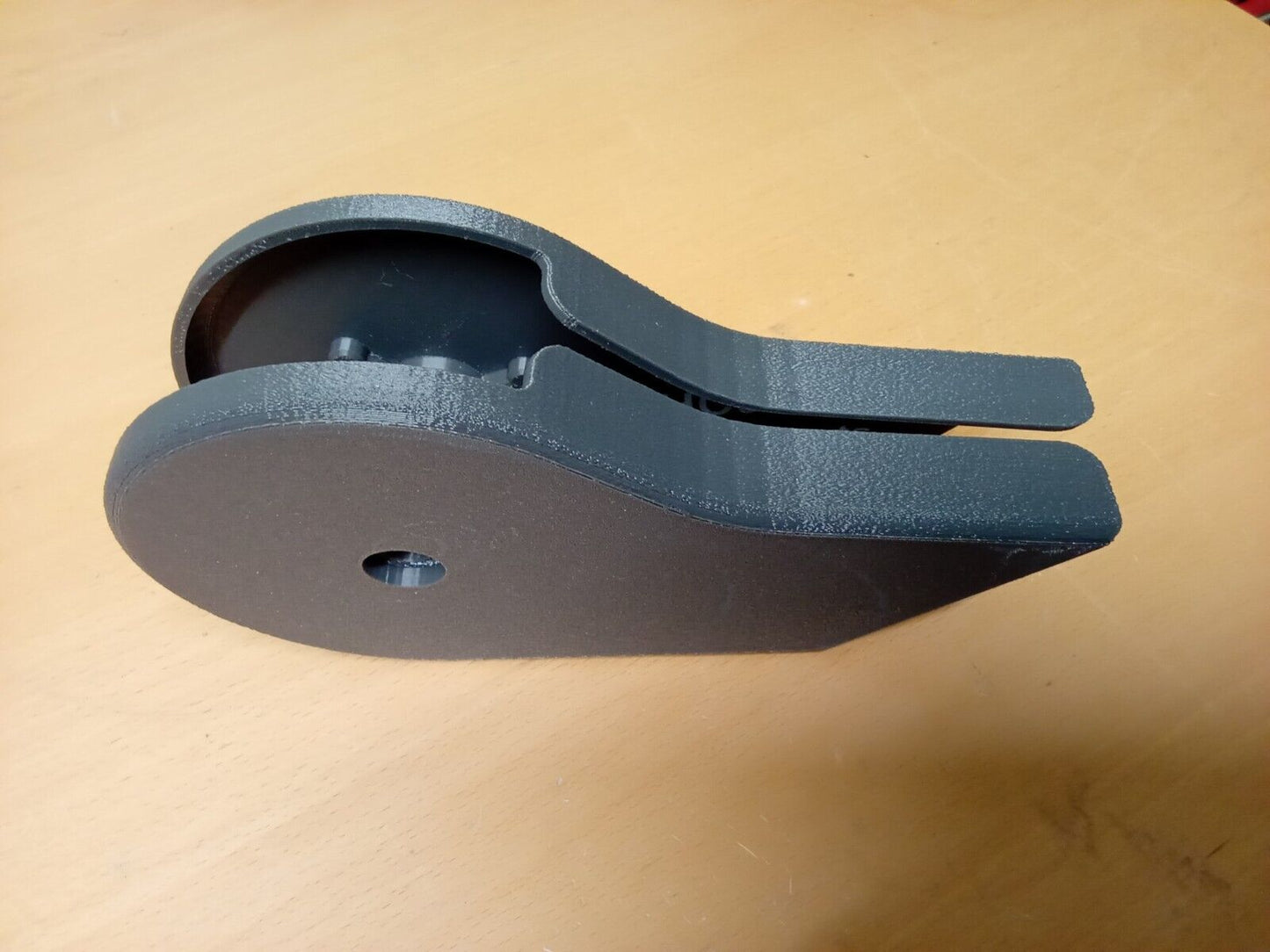 Pair of dark granite gray textured plastic split seat hinge covers for 1992-1997 Ford F150, F250, and F350 trucks, showing a rounded shape with a central mounting hole.