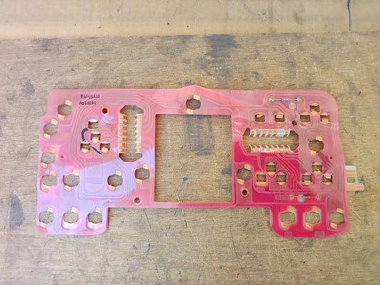 Ford instrument cluster flexible circuit board for 1992-1993 Bronco, F-150, F-250, and F-350 with tachometer, showing pink backing with intact copper circuitry.