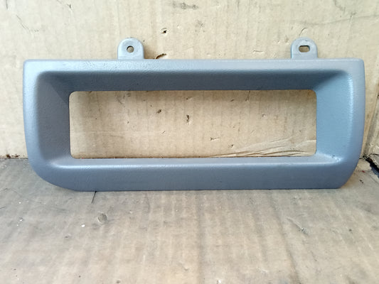 Light gray heater bezel for 1992-1996 Ford F150, F250, F350, Bronco; mounts around dash heater controls.