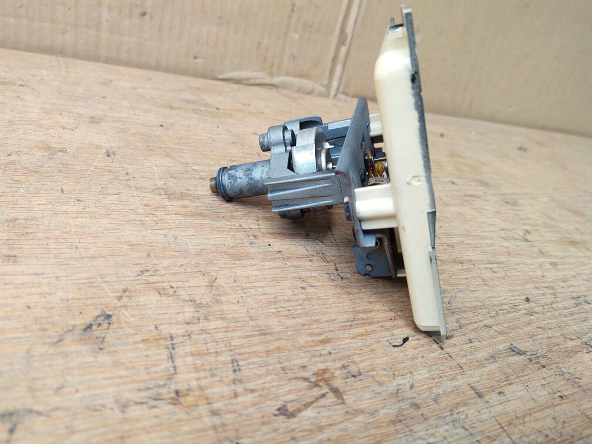 Profile and rear view of an OEM Ford speedometer assembly (part E1TZ-17255-B) for 1980-1986 F-150, F-250, F-350, and Bronco, showing the mechanical drive gear and housing.
