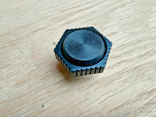 Original Ford black windshield wiper switch knob with a hexagonal shape, ridged sides, and a circular top with concentric rings, compatible with 1980-1991 Bronco and F-Series trucks.