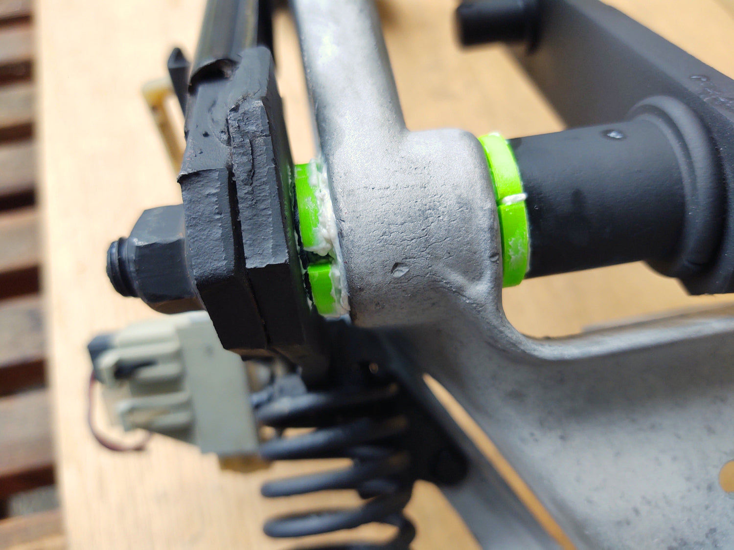 Bushings installed in clutch pedal bracket